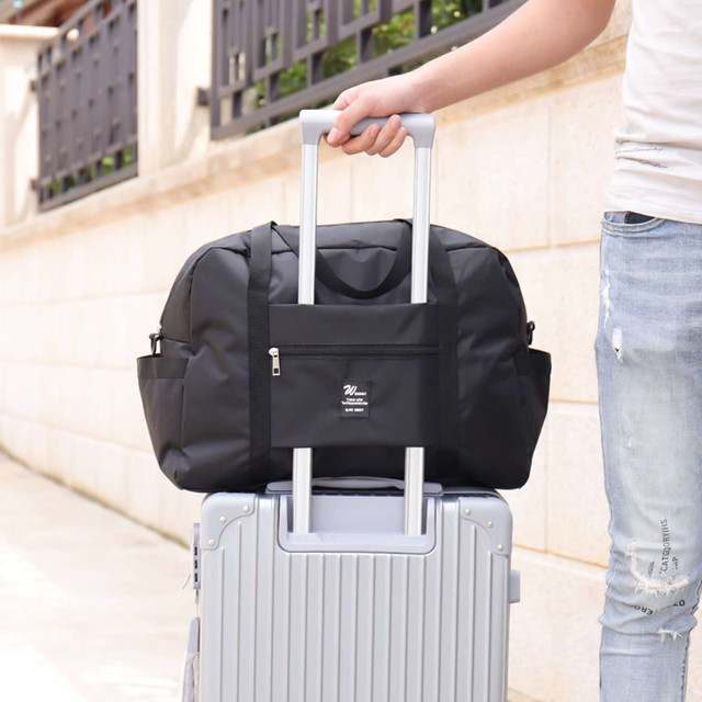 Travel bag for the plane, tourist sports cabin, hand luggage, roomy for a suitcase, holidays 36l Alogy Black